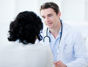 Doctors with patient